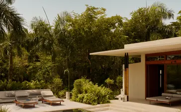 Casita exterior with plunge pool and dining area at Amanera resort.
