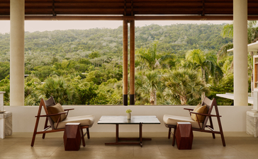 Bar at Amanera resort overlooking Dominican Republic valley landscape.