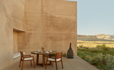 Girijaala Suite balcony with dining table at Amangiri resort, overlooking Utah desert landscape.