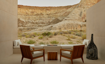 Girijaala Suite with two chairs facing expansive desert views at Amangiri resort, Utah.
