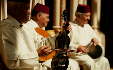 Musicians performing traditional instruments at Amanjena's dining venue.