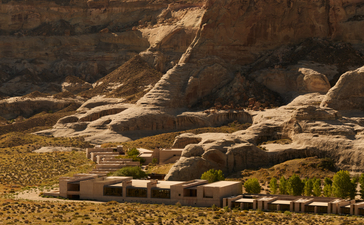 Amangiri resort nestled against rust-coloured desert cliffs in Utah, USA.