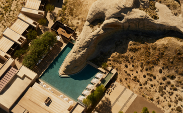Aerial view of Amangiri's plunge pool surrounded by desert landscape.