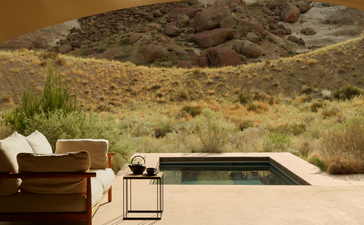 Pavilion exterior at Amangiri resort with plunge pool overlooking desert landscape.