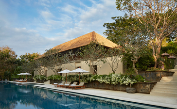 Villa 5 main pavilion at Aman Villas at Nusa Dua, with thatched roof structure overlooking an infinity pool.