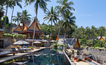 Eight-bedroom ocean villa terrace overlooking infinity pool and tropical gardens at Amanpuri.