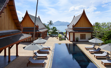Seven-bedroom garden villa at Amanpuri with infinity pool, Thai pavilions and sun loungers.