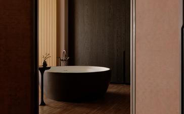 曼谷奈乐安缦酒店房间内的独立式浴缸，采用现代简约设计。