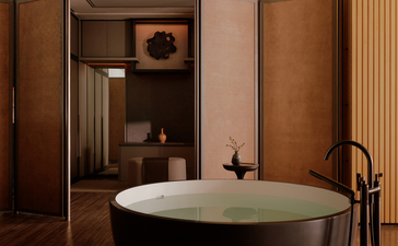 曼谷奈乐安缦酒店房间内的独立浴缸，配有深色木质镜柜和简洁现代设计。