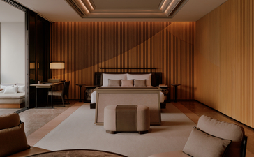 غرفة نوم رئيسية دافئة بألوان بنية وخشبية في أمان ناي ليرت بانكوك.