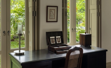 Garden bedroom desk at Amangalla, Sri Lanka, with views to tropical surroundings.