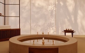 Grand tented pool pavilion with sunken circular bath at Aman-i-Khas, India.