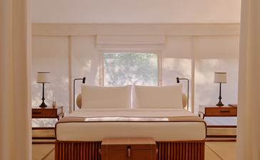 Tented pool pavilion with a large window at Aman-i-Khas, India.