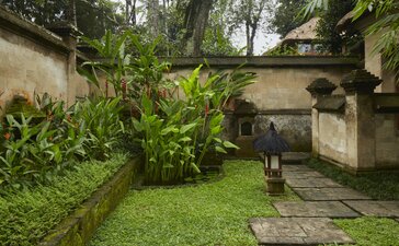 Garden pavilion surrounded by lush greenery at Amandari, Indonesia.