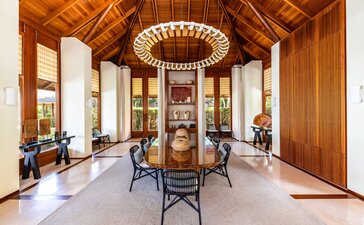 Six-bedroom villa at Amanyara with wooden pavilion, central dining area and ocean views, Turks and Caicos.