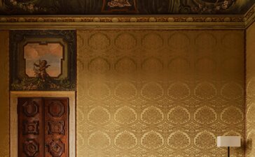 Guarana Room at Aman Venice, Venice, Italy: gilded walls and ornate ceiling with period furniture.