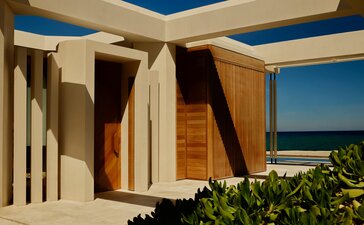 Beachfront casita exterior at Amanvari with modern architecture and ocean views, Mexico.
