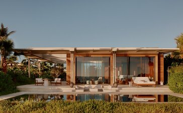 Beachfront casita with wooden frame and open-air living spaces at Amanvari, Mexico.