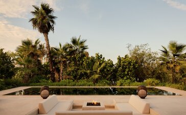Estuary Casita with private pool overlooking palm trees and mangroves at Amanvari, Mexico.