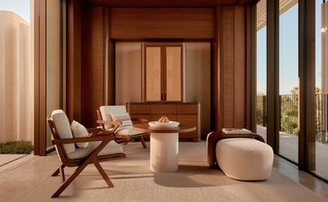 Horizon Casita living area at Amanvari, Mexico, with wooden interiors and contemporary furnishings overlooking the landscape.