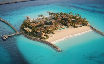Double Beach Island Residence at Amanolu surrounded by turquoise waters and white sand beaches.
