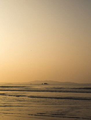 Sunrise over calm waters at Amanwella, Sri Lanka.