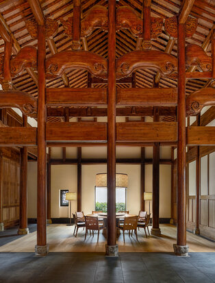 Amanyangyun gallery with symmetrical wooden architecture and central courtyard view.
