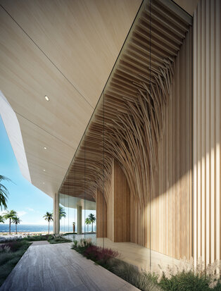 Covered walkway with vertical wooden slats and polished flooring at Aman Miami Beach, framed by natural light and ocean views.