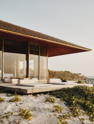 Coastal accommodation at Aman overlooking the sand and sea