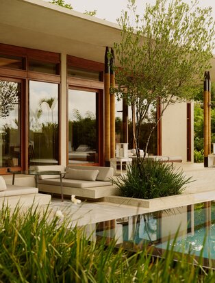 Bay View Pool Casita at Amanera with sun loungers overlooking the Dominican coast.