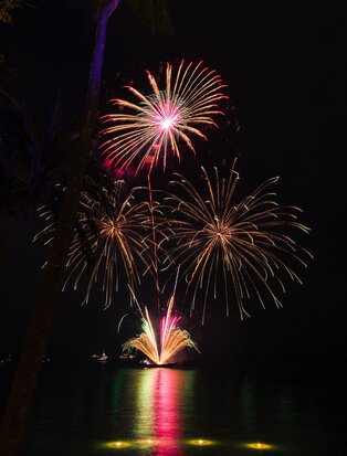 Fireworks burst over the sea at Amanpuri during New Year's Eve celebrations.