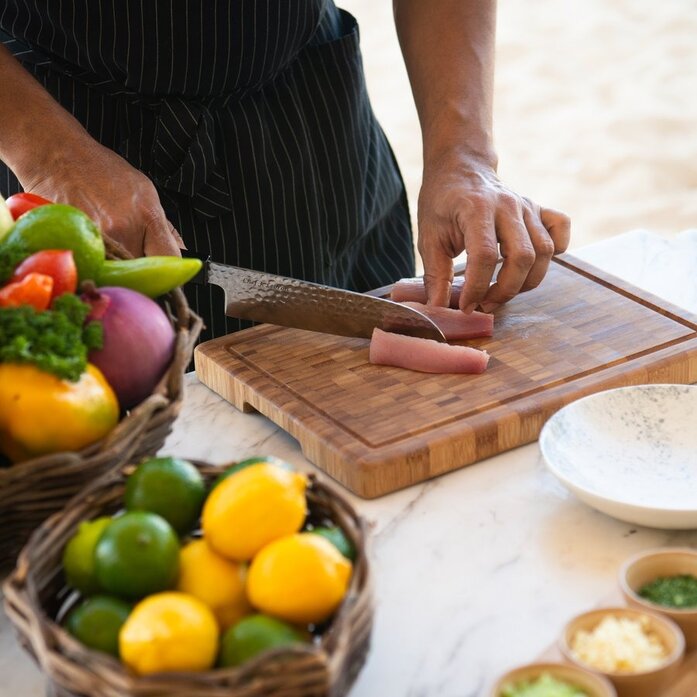 Chef préparing ceviche during a cooking class at Amanera resort, Dominican Republic.