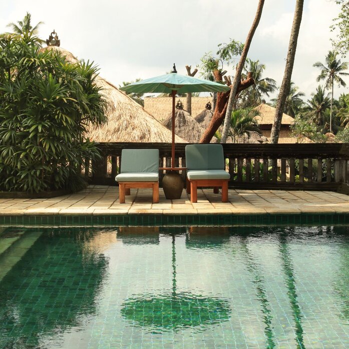 Ayung Pool Duplex Villa at Amandari, Indonesia, with emerald-tiled swimming pool and traditional pavilion.