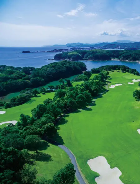 Amanemu golf course overlooking forested islands and bay waters, Japan.