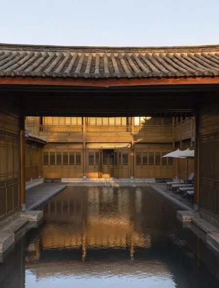 Courtyard with traditional tilework and reflected light at Amandayan.