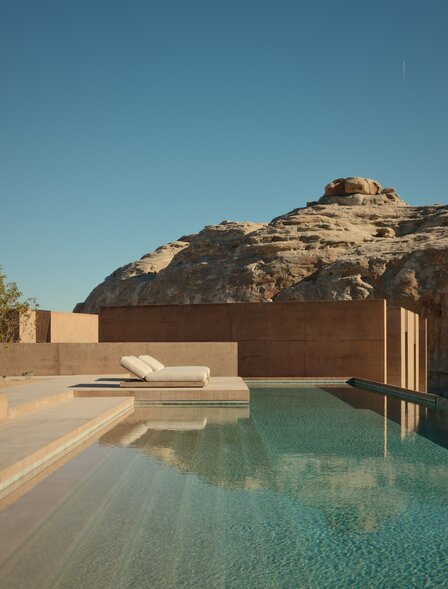 Six-bedroom villa with infinity pool overlooking desert rock formations at Amangiri, USA.