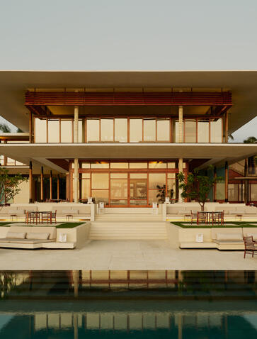 Contemporary casa with infinity pool and wooden architecture at Amanera.