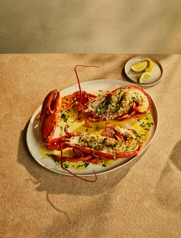 Nura beach club at Amanzoe resort serves grilled red peppers with herbs and olive oil.
