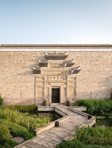 Four-bedroom antique villa at Amanyangyun, Shanghai, with traditional architecture and stone pathway.