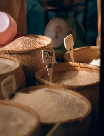 Woven baskets of fresh produce at Thimphu Farmers Market, Amankora, Bhutan.