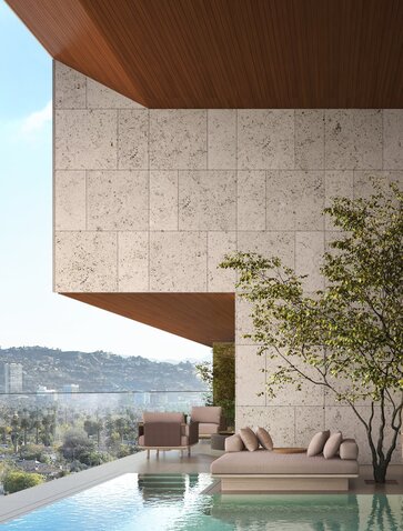 Aman Beverly Hills terrace with curved wooden overhang, infinity pool, and Los Angeles cityscape views.