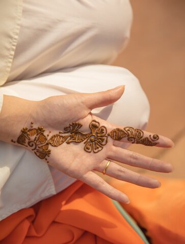 Henna design adorning a hand at Amanbagh, India.