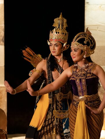 Ramayana Dinner performance at Amanjiwo resort, two dancers in traditional Javanese costume and ornate golden headdresses.