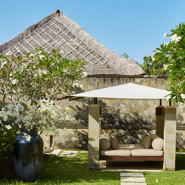 Five-bedroom villa with thatched roof and garden pavilion at Aman Villas at Nusa Dua, Bali.