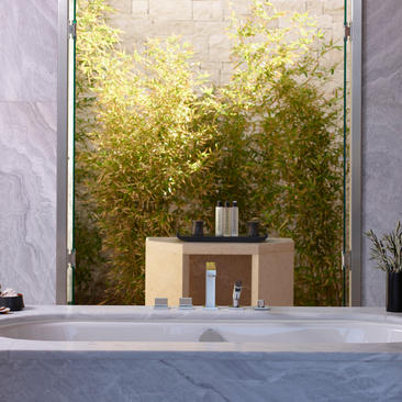 Villa reception area with moss wall backdrop at Amanzoe resort.