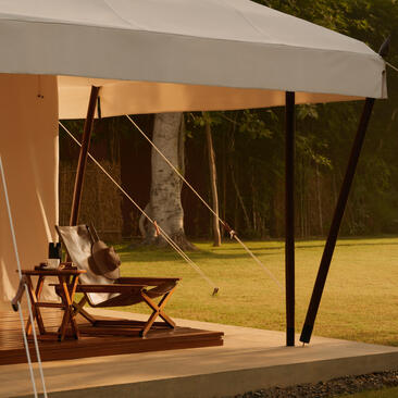 Lounge tent exterior at Aman-i-Khas with canvas canopy, wooden deck and open views to the landscape.