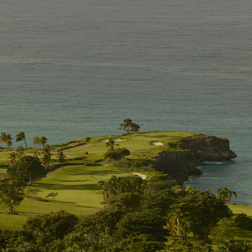 Aerial view of a verdant peninsula with foraging and hiking trails at Amanera resort.