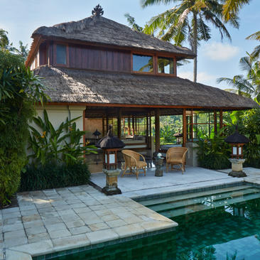 Duplex pool suite exterior at Amandari with timber pavilion, plunge pool and tropical gardens.