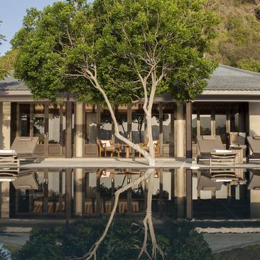 Five-bedroom bay villa with reflecting pool and mature trees at Amanoi.
