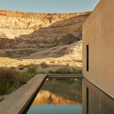Girijaala Suite with reflection pool overlooking desert landscape at Amangiri resort.